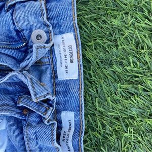 Cotton on baggy jeans with rips in knees